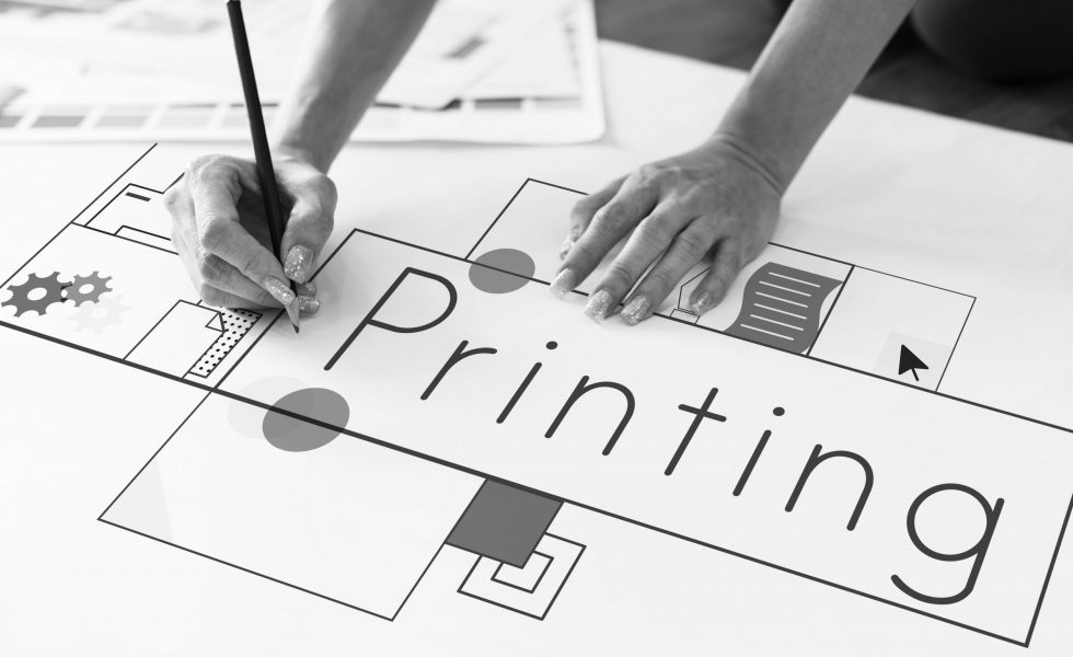 Hands working on network graphic overlay banner on desk